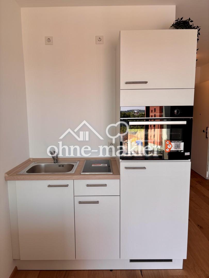 Erstbezug! Möbliertes Studentenapartment mit Balkon und EBK direkt an der Uni - Photo 2