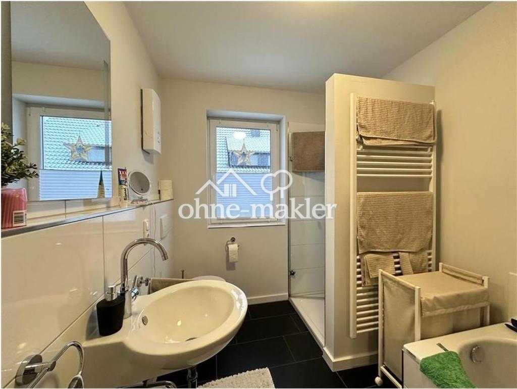 Seltene 3-Zimmer-Wohnung mit Terrasse, Garten & Garage in Sohren - Photo 2