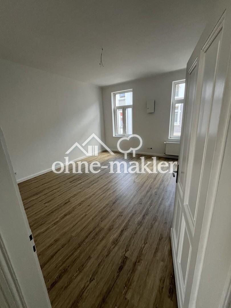 Kernsanierte Altbau-Wohnung in zentraler Lage mit Balkon und Blick ins Grüne - Photo 5