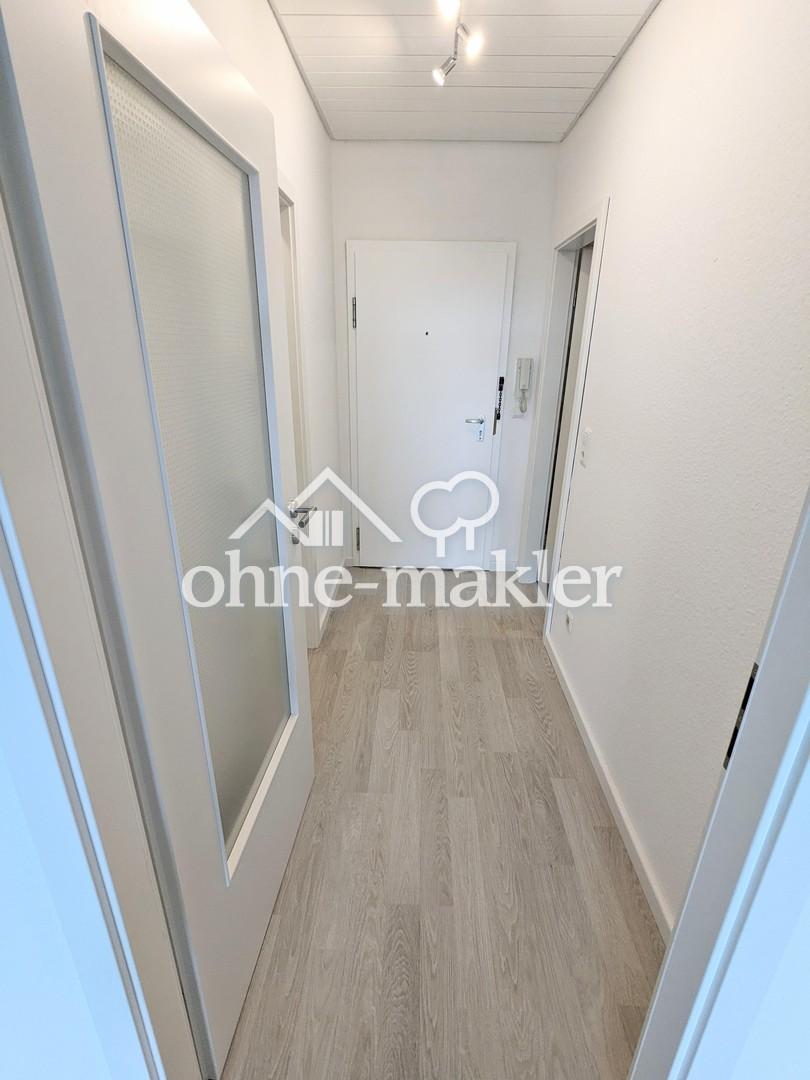 Helle 2,5-Zimmerwohnung mit traumhaftem Fernblick ins Grüne - Foto 2