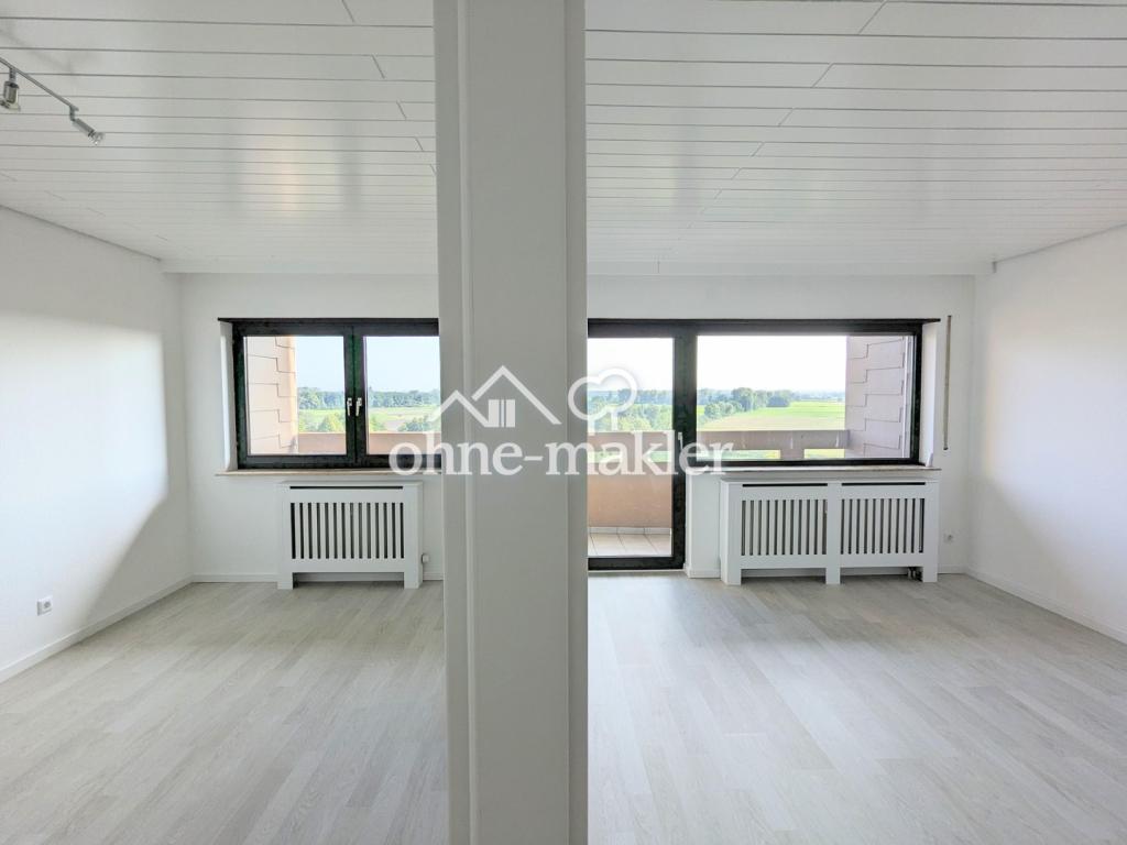 Helle 2,5-Zimmerwohnung mit traumhaftem Fernblick ins Grüne - Foto 2