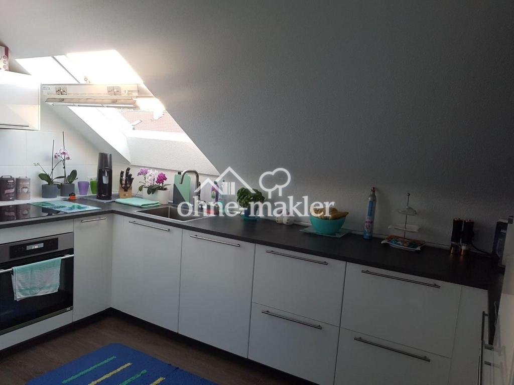 Traumhafte Dachgeschosswohnung - zeitnah frei - Foto 1