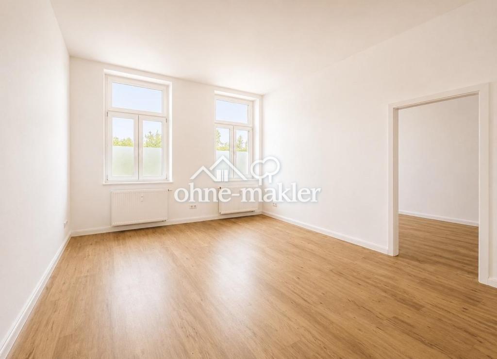 Stilvolle Altbauwohnung nach Kernsanierung – 2,5 Zimmer mit hohen Decken in zentraler Lage - Photo 2