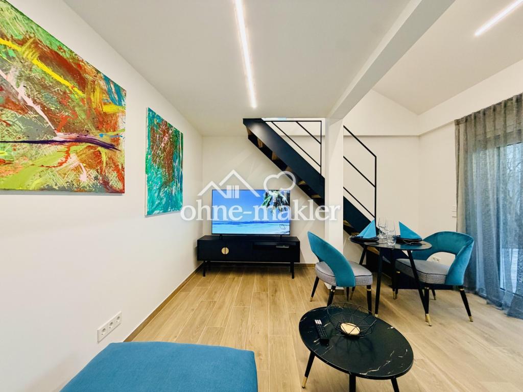 Top saniertes Mehrfamilienhaus mit vier komplett möblierten 2-Zimmer-Design-Apartments! - Foto 5