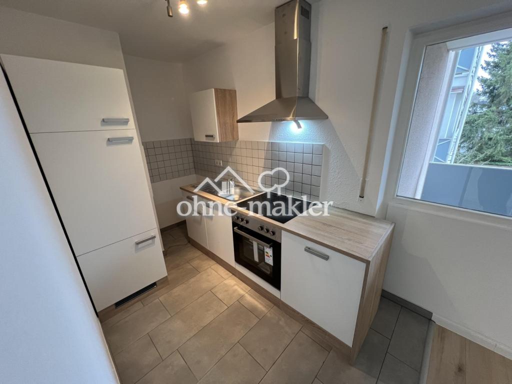 Renovierte 1,5-Zi.-Wohnung mit Südbalkon, EBK & TG ab 01.08. - Foto 2