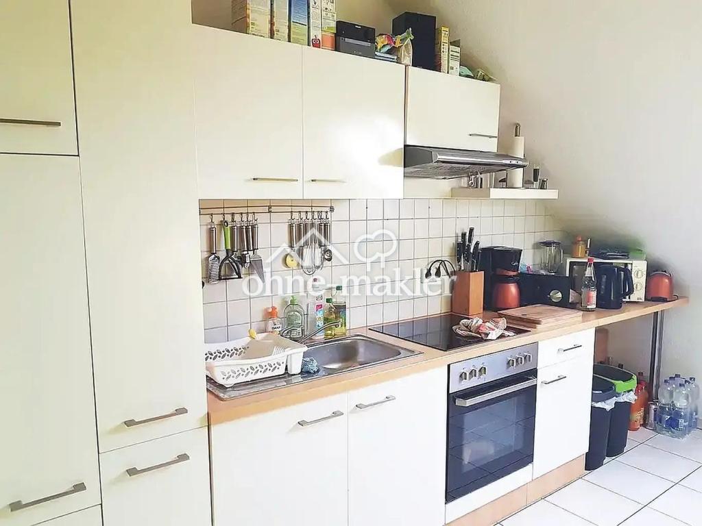 großzügige und gemütliche 2 Zimmer Dachgeschoss Wohnung - Photo 2