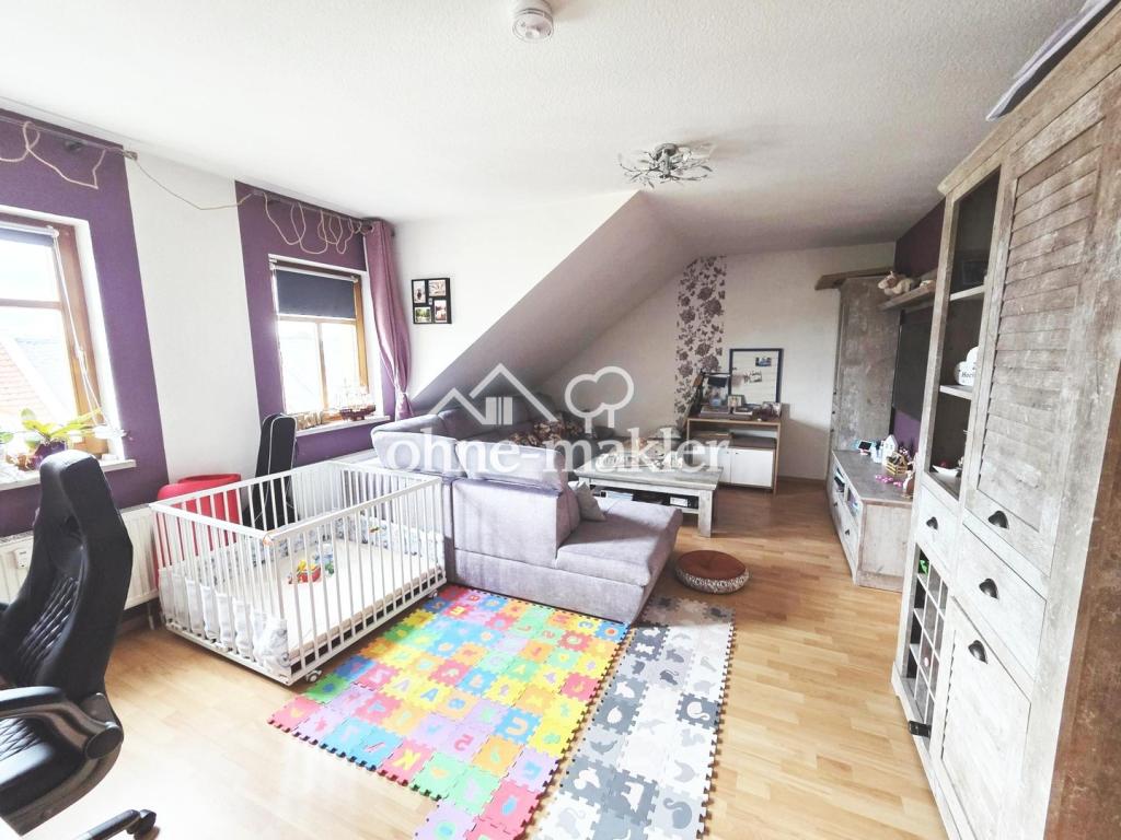 großzügige und gemütliche 2 Zimmer Dachgeschoss Wohnung - Foto 1