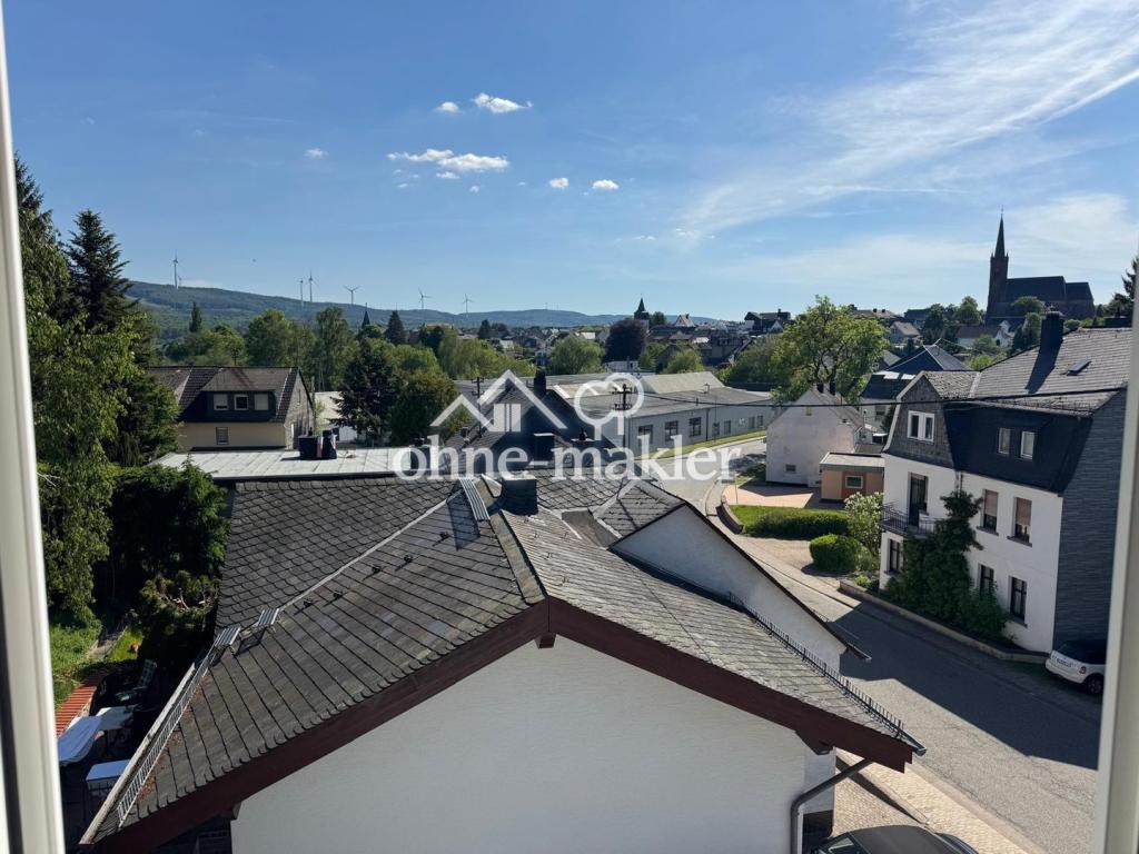 Sofort bezugsfertige 3-Zimmer-Dachgeschosswohnung mit 85 m² und schönem Ausblick - Foto 4