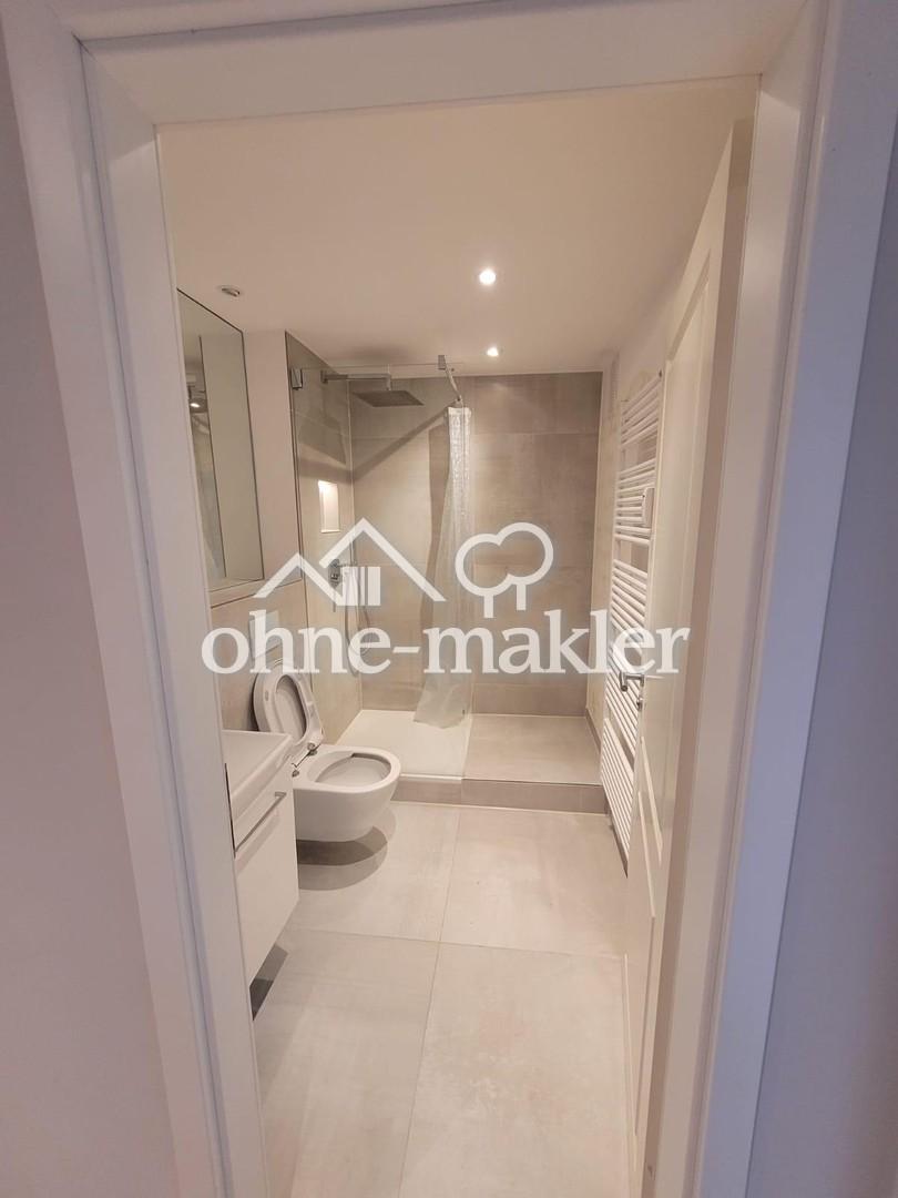 Hochwertig sanierte 2-Zimmer-Wohnung mit Balkon, TG-Stellplatz & neuer Einbauküche - Foto 5
