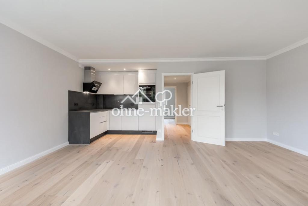 Hochwertig sanierte 2-Zimmer-Wohnung mit Balkon, TG-Stellplatz & neuer Einbauküche - Foto 1