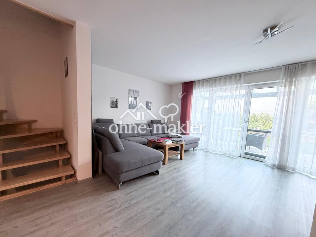 Neuwertiges Reihenmittelhaus mit ausgebautem Dachgeschoss in ruhiger Siedlungslage - Photo 1