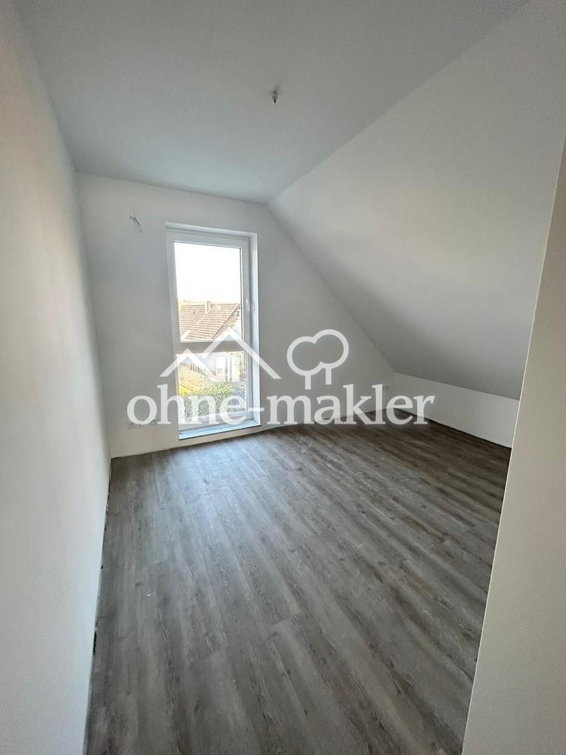Gemütliches Wohnen im Neubau mit großem Balkon! - Foto 2