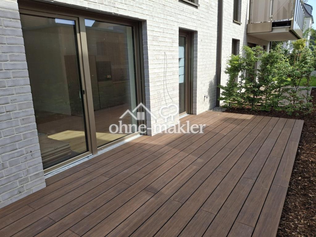 Erstbezug mit Terrasse: Stilvolle 3‑Zi.-Wohnung + Einbauküche inklusive | KfW‑40 - Photo 4