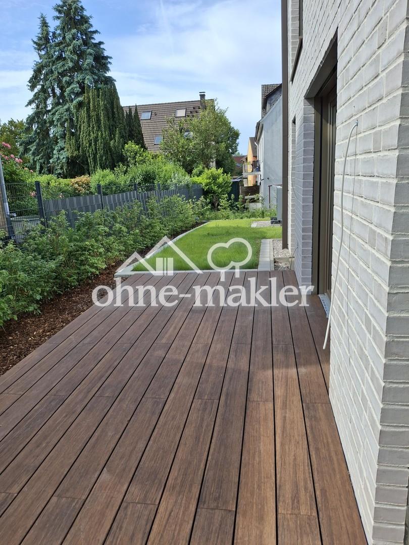 Erstbezug mit Terrasse: Stilvolle 3‑Zi.-Wohnung + Einbauküche inklusive | KfW‑40 - Photo 5