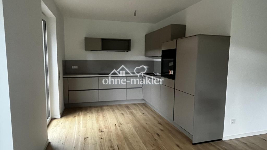 Erstbezug mit Terrasse: Stilvolle 3‑Zi.-Wohnung + Einbauküche inklusive | KfW‑40 - Photo 1