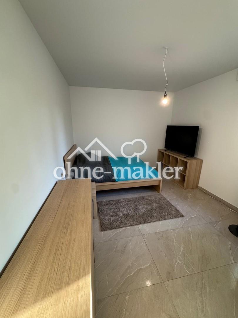 Schöne 3 Zimmer-Wohnung mit Balkon im Neubau - Foto 4