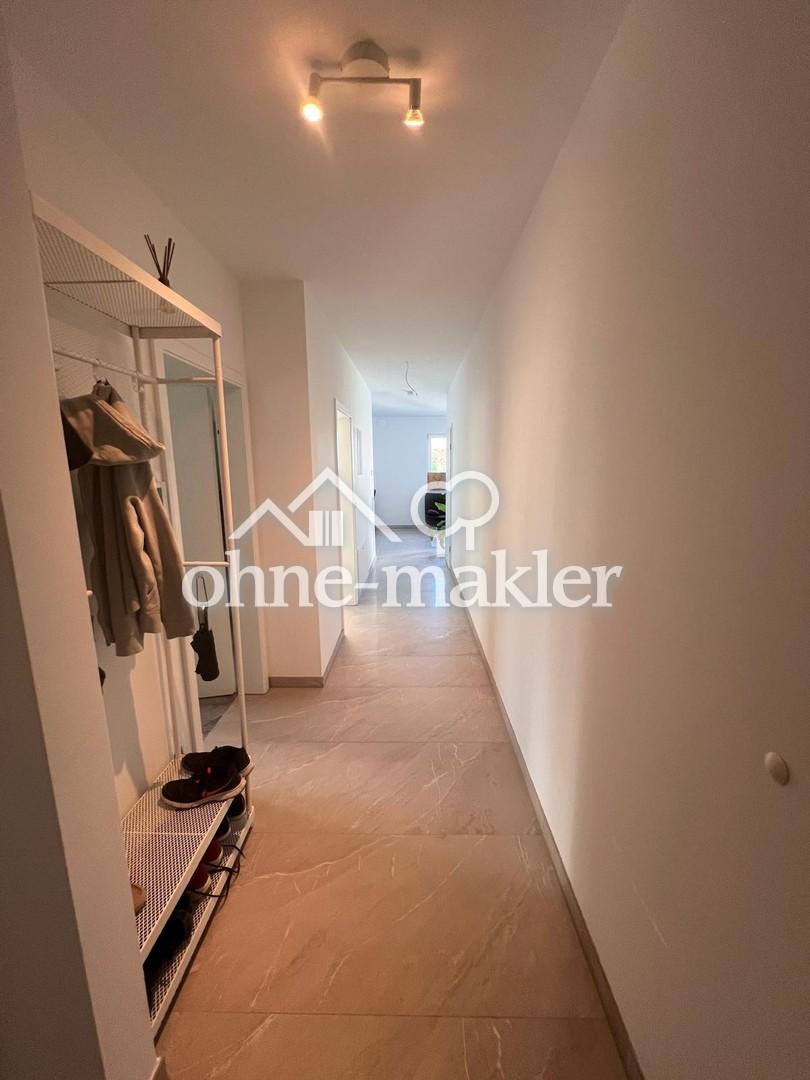 Schöne 3 Zimmer-Wohnung mit Balkon im Neubau - Foto 5