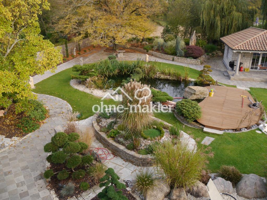 Exklusive freistehende Villa mit Traumgarten - Foto 3