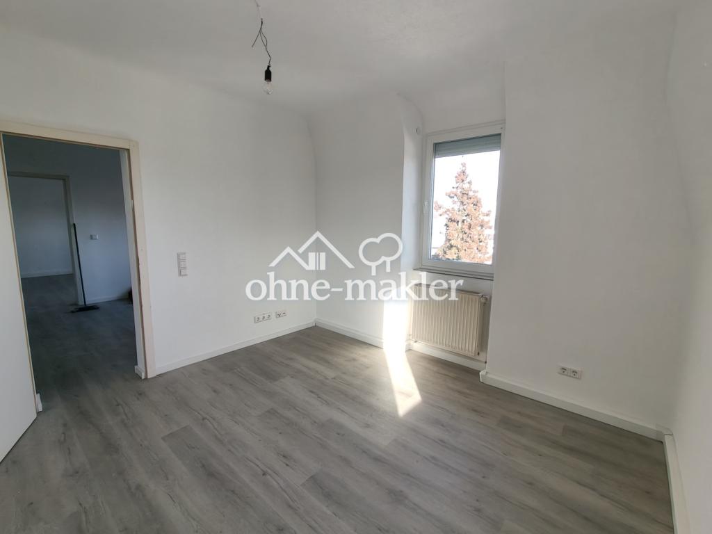 Lichtdurchflutete 3-Zimmer-Dachgeschosswohnung mit traumhaftem Ausblick – Erstbezug nach hochwertige - Photo 4