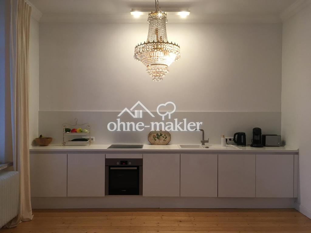 Altbau am Wedekindplatz mit mega Balkon & Einbauküchenzeile, ideal zu zweit - Foto 1