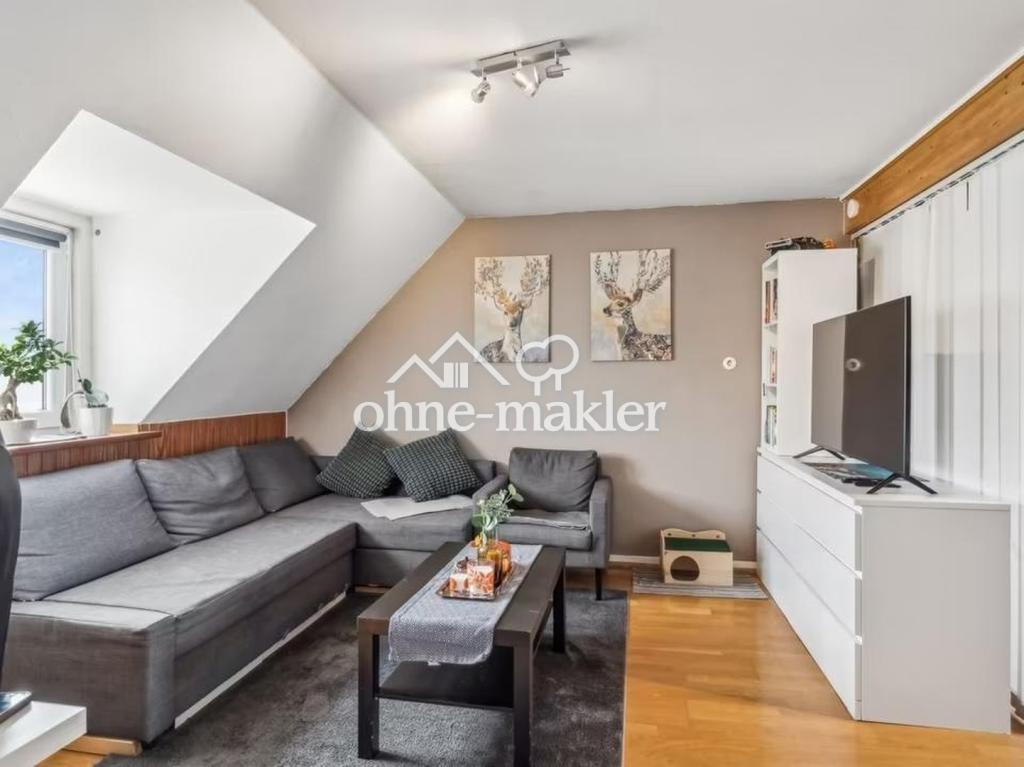 Dachgeschosswohnung in super Lage mit kleiner Oase, Gemeinschaftsgarten - Photo 1