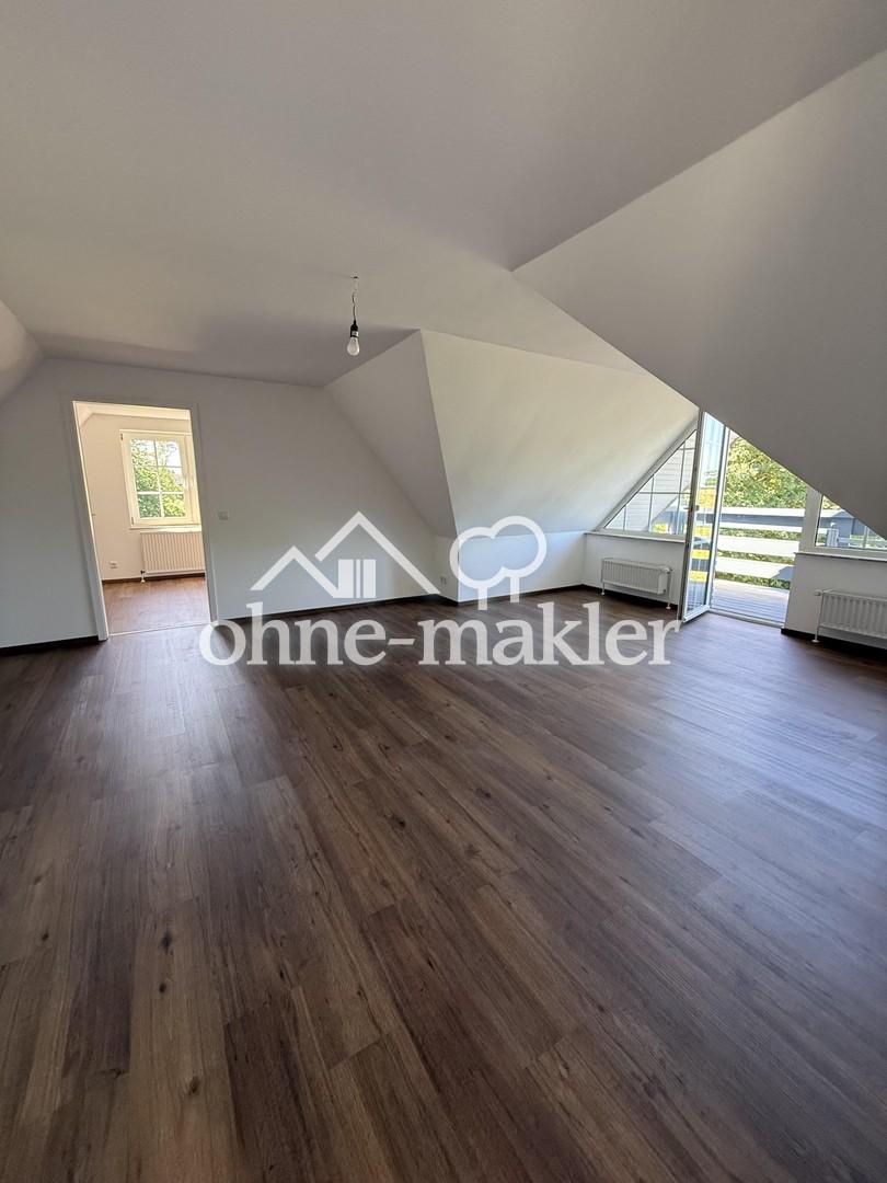 Traumhafter Erstbezug im DG! Sanierte Dachgeschoss-Oase mit Feldblick & Stellplatz - Foto 1