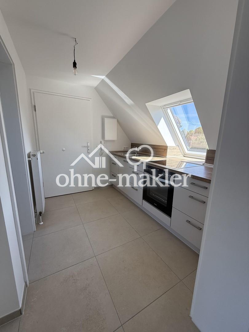 Traumhafter Erstbezug im DG! Sanierte Dachgeschoss-Oase mit Feldblick & Stellplatz - Photo 3