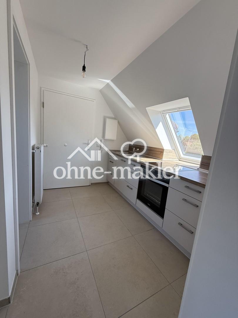 Traumhafter Erstbezug im DG! Sanierte Dachgeschoss-Oase mit Feldblick & Stellplatz - Photo 4