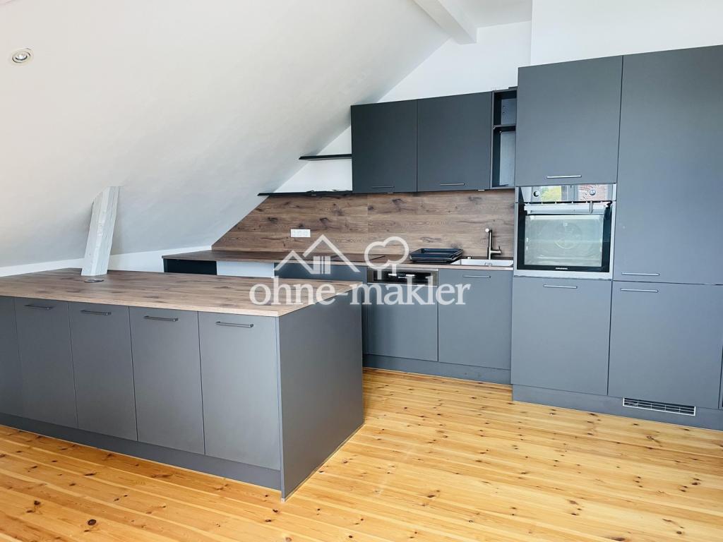 Renovierte Dachgeschoss Wohnung mit Stadtparkblick - Foto 1