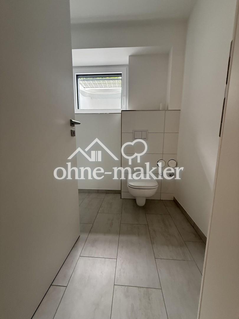 Neubau! Stilvolle 2-Zimmer-Wohnung in Grömitz mit dänischer Design-Küche, 14m² Terrasse & Feldblick - Foto 5