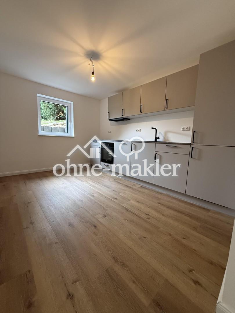 Neubau! Stilvolle 2-Zimmer-Wohnung in Grömitz mit dänischer Design-Küche, 14m² Terrasse & Feldblick - Foto 1