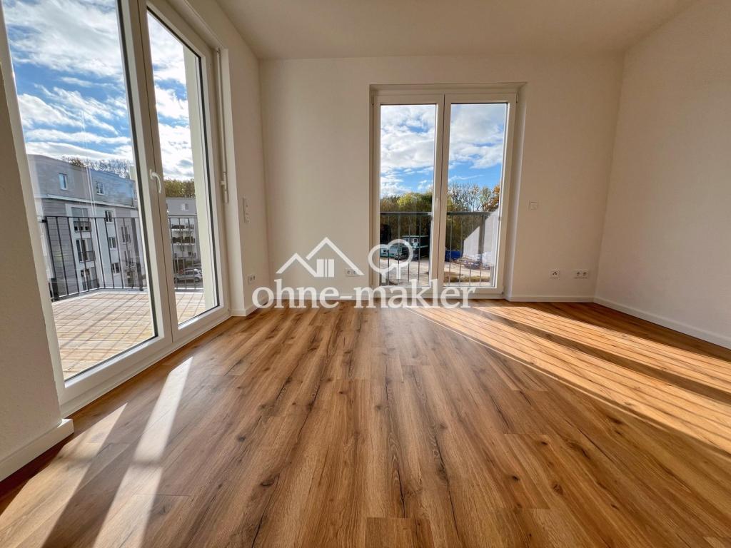 Exklusiver NEUBAU - lichtdurchflutete 3-Zimmer-Wohnung mit Balkon und Grünblick - Foto 1