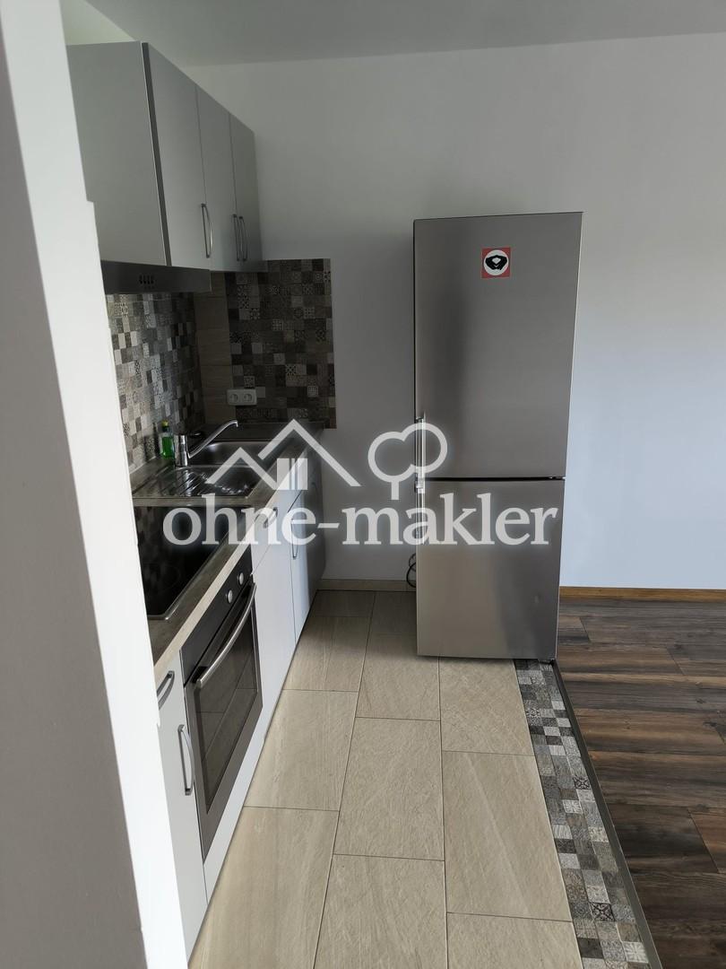 Top-saniertes 1-Zi.-Apartment mit Loggia, EBK & Waldblick in bester Verkehrslage von Neu-Isenburg - Photo 3