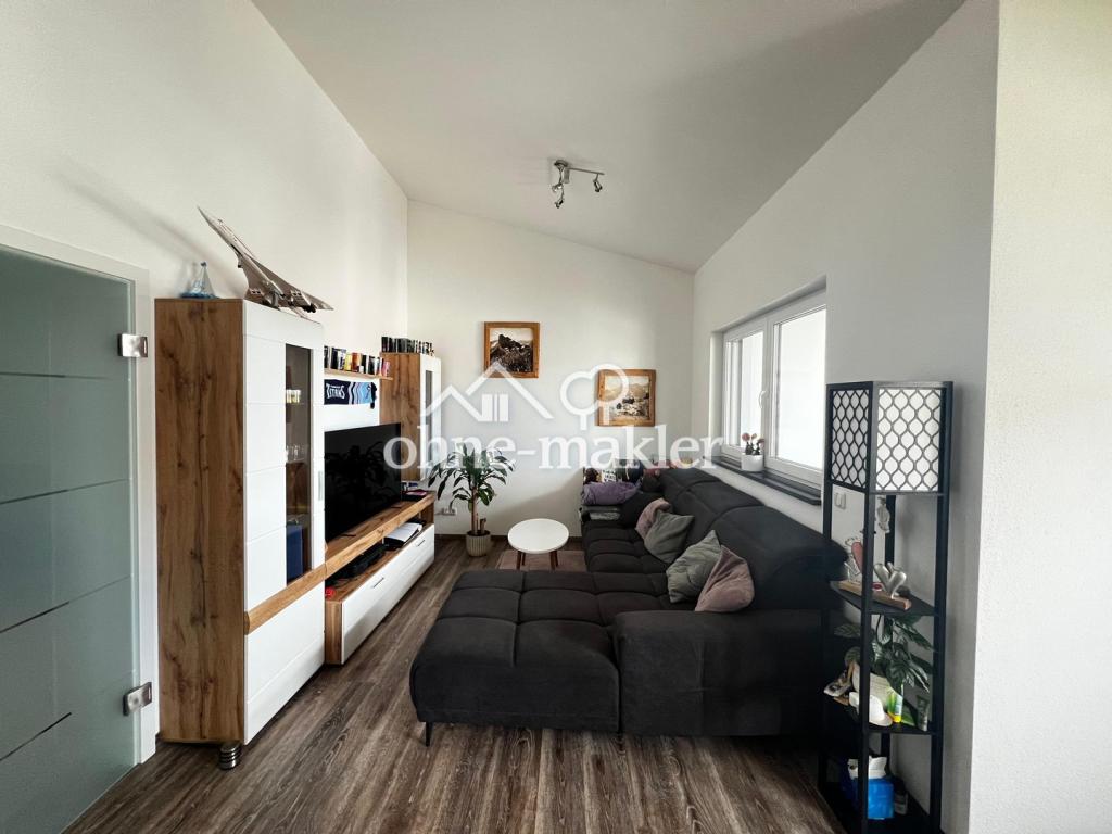 Modern & energieeffizient wohnen: 69 m² Dachgeschosswohnung mit TG-Stellplatz ab 01.09. - Foto 1