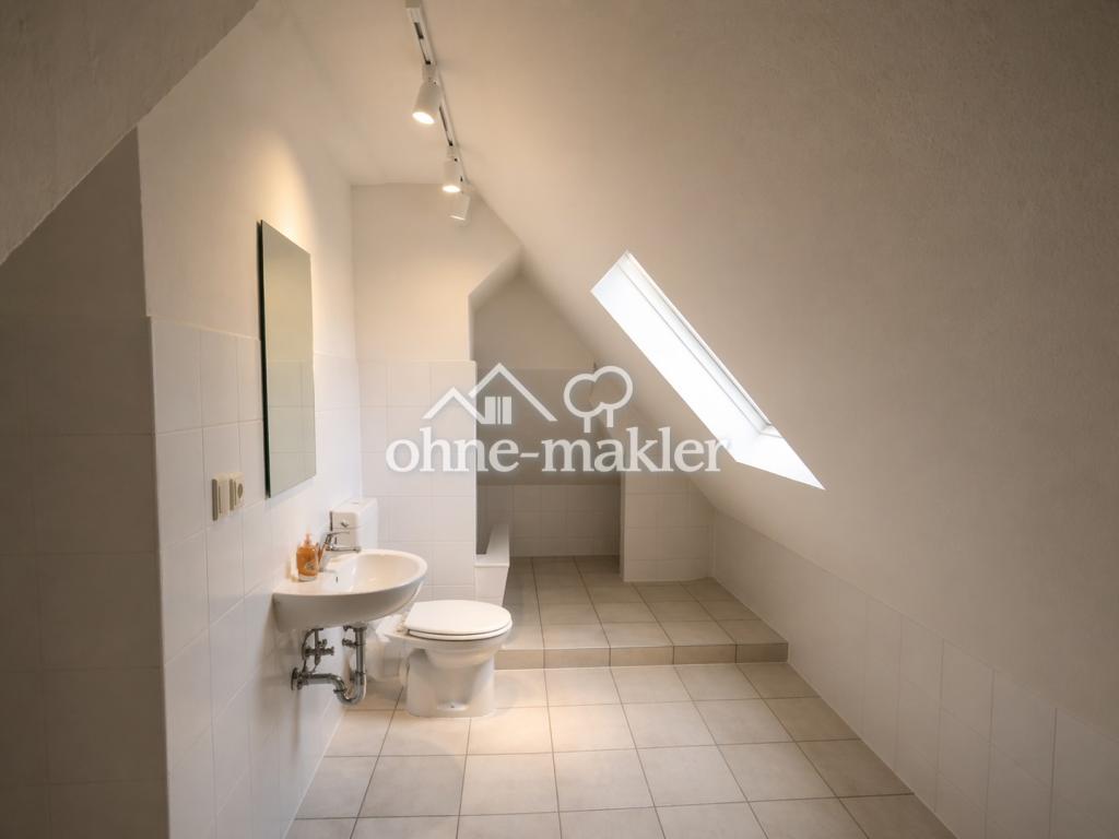 Helle 2,5-Zimmer-Wohnung mit neuer Einbauküche, Dielenboden und Gartennutzung - Photo 1