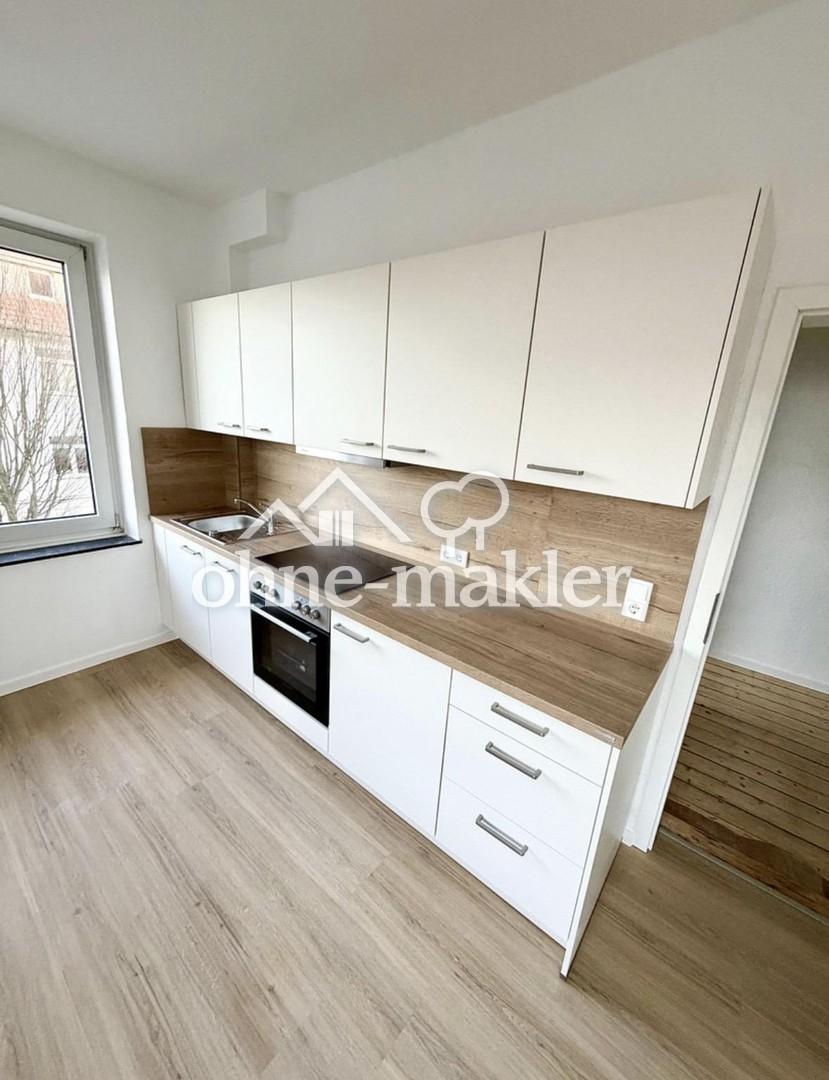 Erstbezug nach Renovierung! 2 Zimmer + Wohnküche + Bad mit Einbauküche - Foto 3