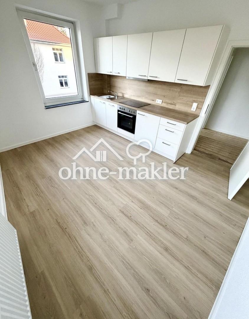 Erstbezug nach Renovierung! 2 Zimmer + Wohnküche + Bad mit Einbauküche - Foto 2