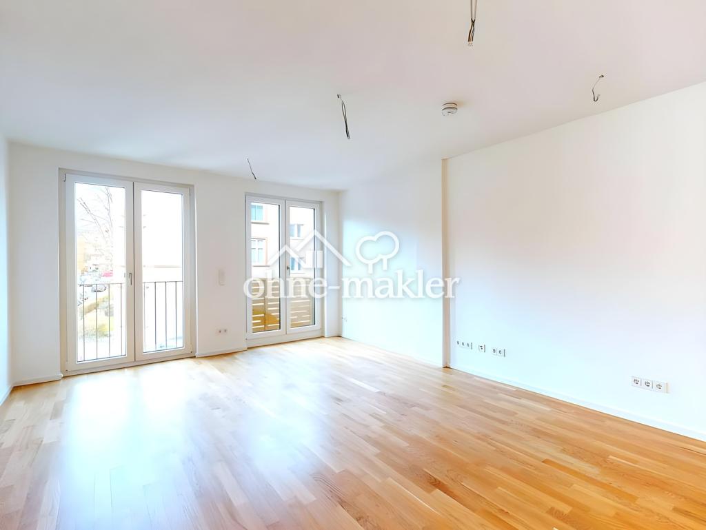 Moderne 2-Zimmer-Wohnung mit Einbauküche, Tiefgarage und Skyline-Deck in Frankfurt-Bornheim - Photo 2