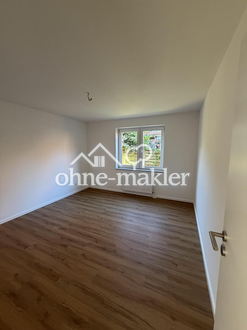 Frisch renoviert! 2-Zimmer-Wohnung mit Terrasse & Garten - Photo 3