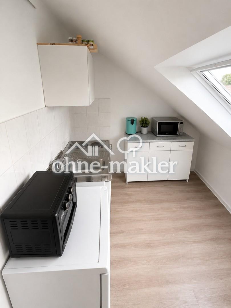 Moderne & energieeffiziente 1-Zimmer-Dachgeschosswohnung in Frankfurt-Bonames - Foto 2