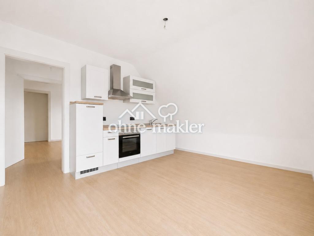 Frisch modernisierte 2-Zimmer-Dachgeschosswohnung mit Einbauküche in Bochum-Wattenscheid - Photo 2