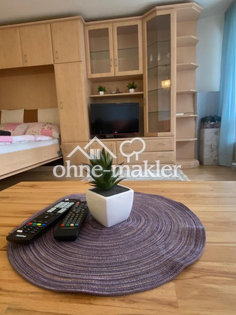 Die Wohnung ist eher praktisch und gemütlich als modern eingerichtet - Photo 5