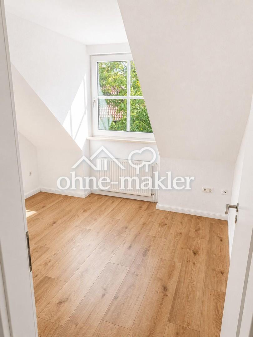 Frisch renovierte 4-Zimmer-Dachgeschosswohnung mit Balkon in ruhiger Lage - Foto 5