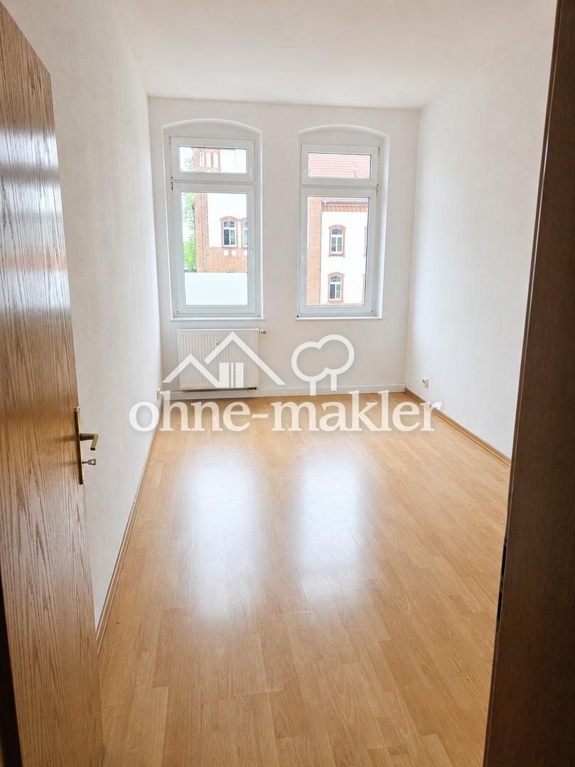 Freundliche 2-Zimmer-Altbauwohnung mit Einbauküche - Foto 4