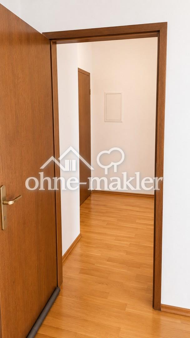 Charmante 1,5-Zimmer-Altbauwohnung mit Parkett & Einbauküche - Photo 4