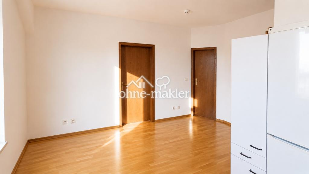 Charmante 1,5-Zimmer-Altbauwohnung mit Parkett & Einbauküche - Photo 3