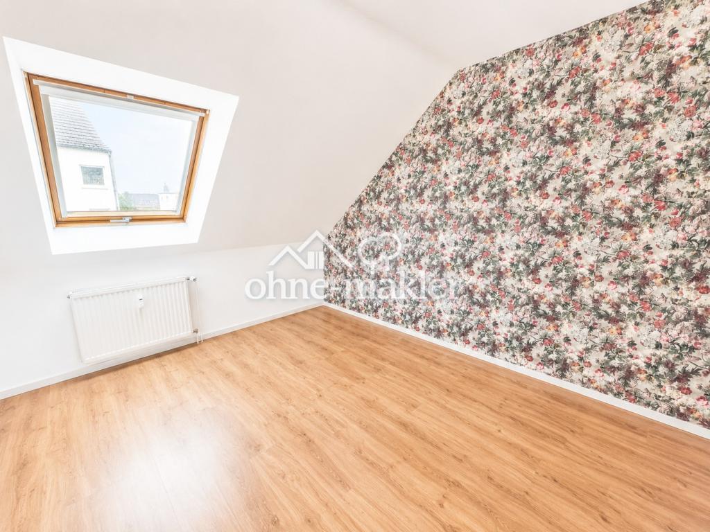 Exklusives Wohnen auf zwei Ebenen – moderne 5-Zimmer-Maisonette mit Balkon & eigener PV-Anlage - Photo 5