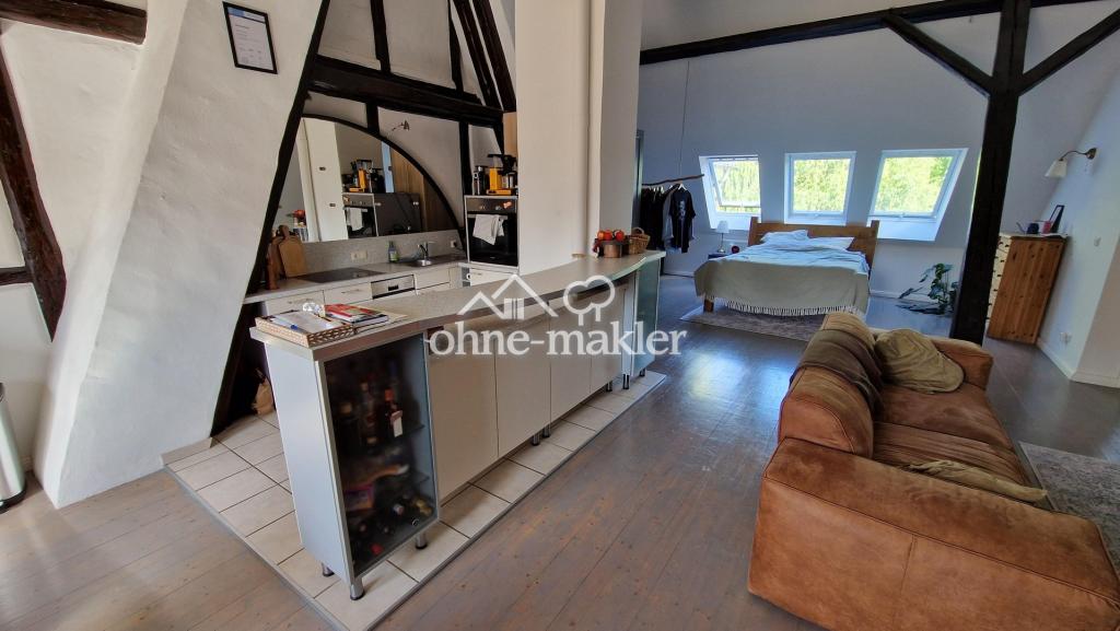 Dachgeschosswohnung mit Gartennutzung im kernsanierten Landhaus - Foto 2