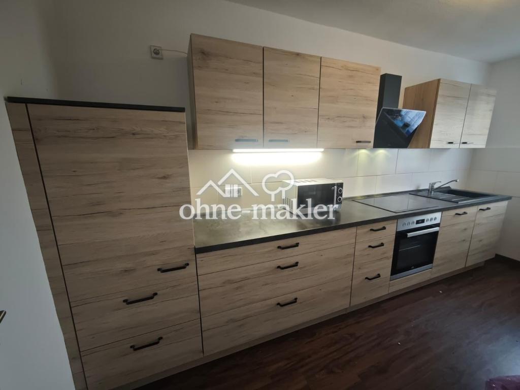 Sanierte 2,5-Raumwohnung mit Balkon und Einbauküche - Foto 1