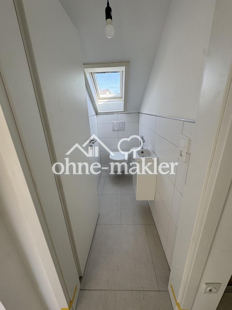 Erstbezug nach Kernsanierung: Moderne 3-Zimmer-Dachgeschosswohnung mit neuer Einbauküche - Foto 2